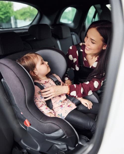 Baby safely secured in certified car seat - VTC Lajoieway Paris