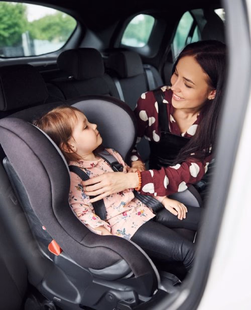 Baby safely secured in certified car seat - VTC Lajoieway Paris